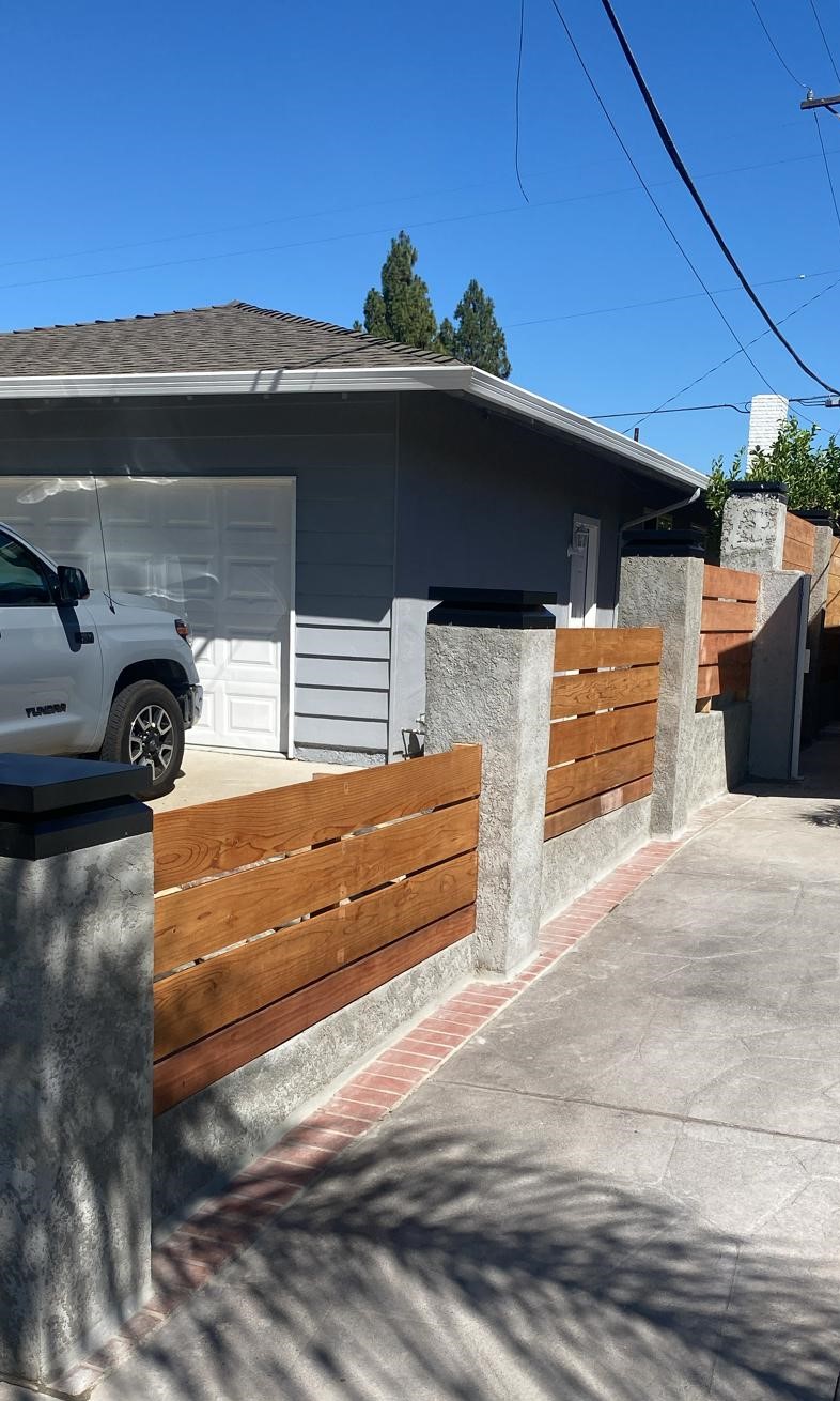 Secure your property and enhance its curb appeal with our professional fencing services